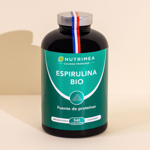 Fondo blanco del bote Espirulina