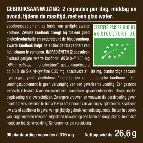 Witte achtergrond van het pillendoosje Gefermenteerde organische zwarte knoflook